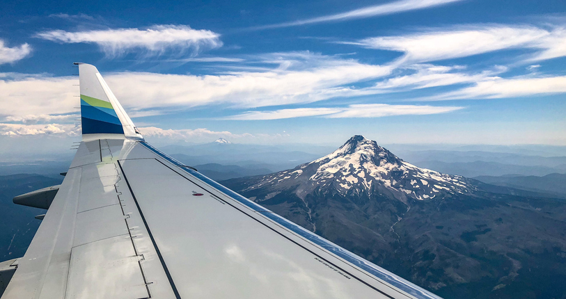 Commercial airline flight over Mount Hood near Portland Oregon